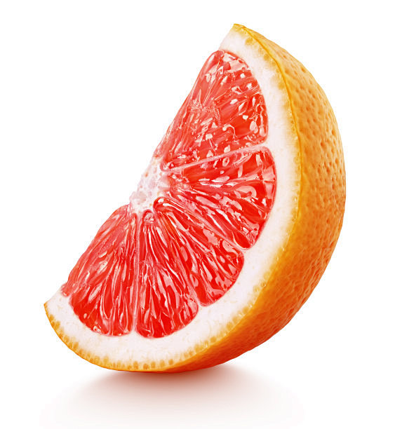 wedgeofpinkgrapefruitcitrusfruitisolatedonwhite