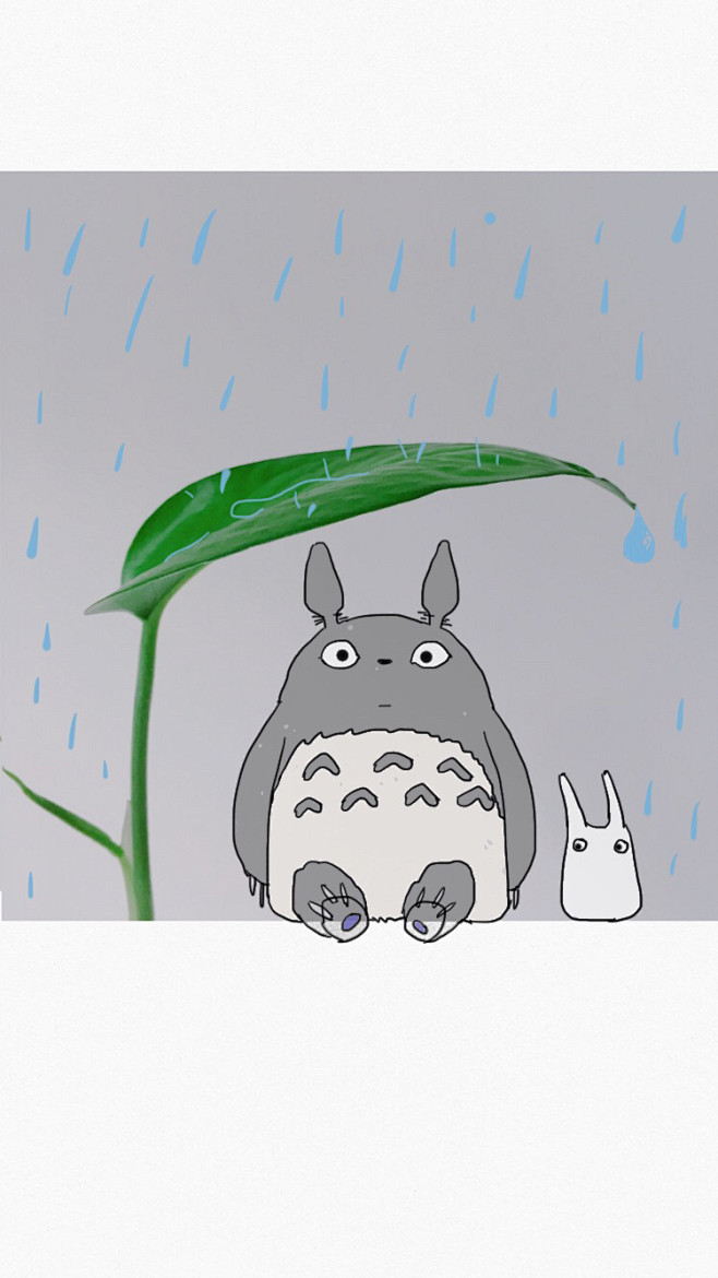龙猫躲雨的叶子卡通画图片