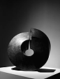 'Split Ring' (1969) by Australian-American sculptor Clement Meadmore (1929-2005). Bronze, 14.5 x 15 x 14 in. Photographed by American photographer Michael Donovan at Marlborough Gallery, NYC. via daily inspiration by Daanizzo