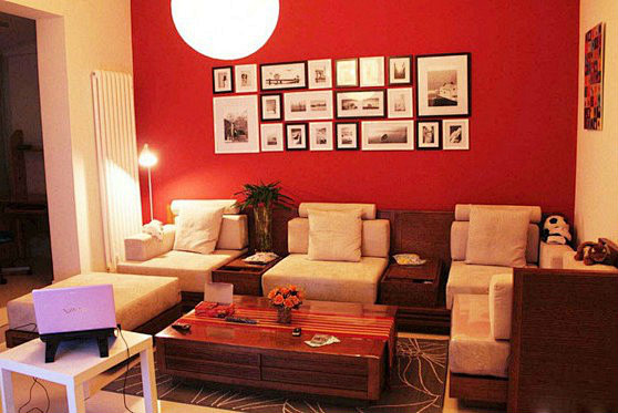 红色沙发背景墙现代客厅效果图