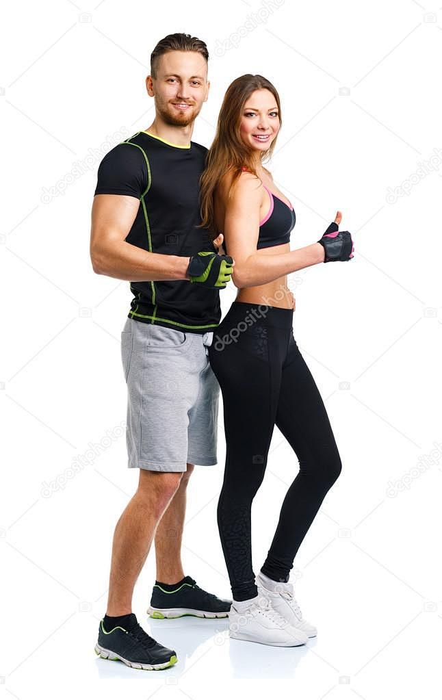 健壮的男人和女人后健身锻炼用手指向上在白色背景上