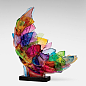 Art Glass Sculpture - This breathtaking piece is created from blown glass forms that have been deliberately broken, then recombined and fused together into a kaleidoscopic sculpture that glows in the light. Securely attached to a black stone base for stab