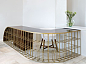 millipede reception desk design: eleftherios ambatzis materials: bronze and palisander veneer wood