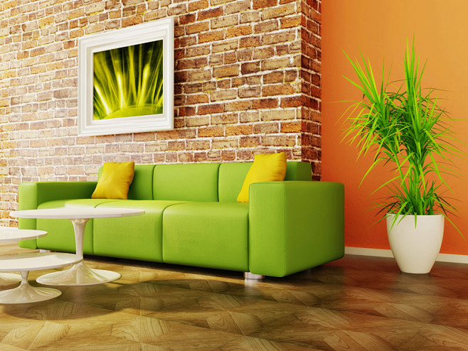 绿色沙发和背景墙图片