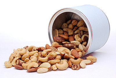 mixed nut spilling from container