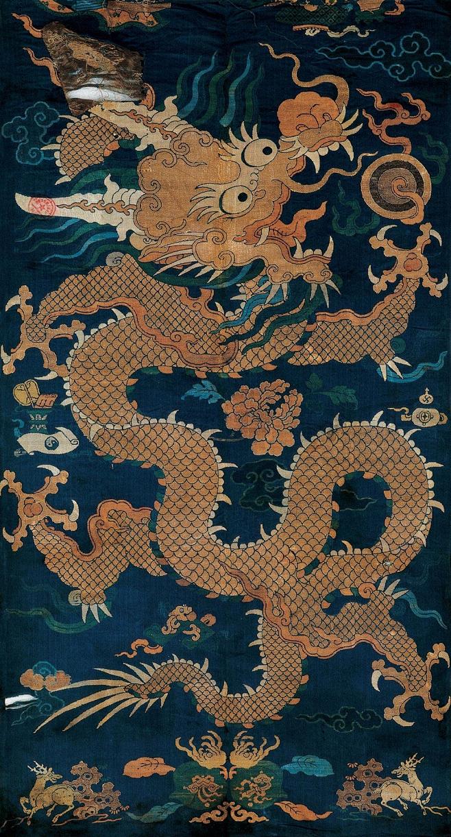 明藏青地织金蟒纹锦