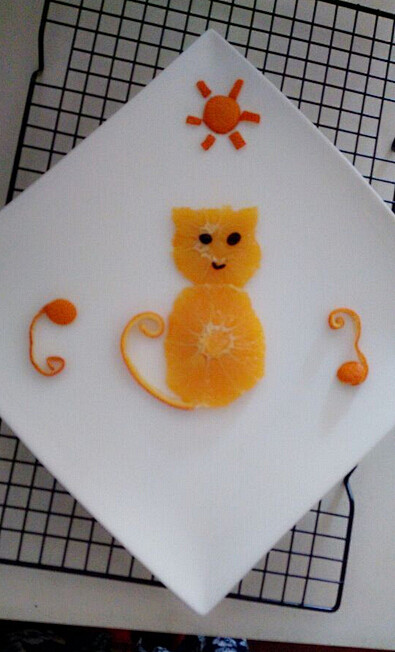 用橙子怎么摆盘可爱的小猫咪水果拼盘美厨邦